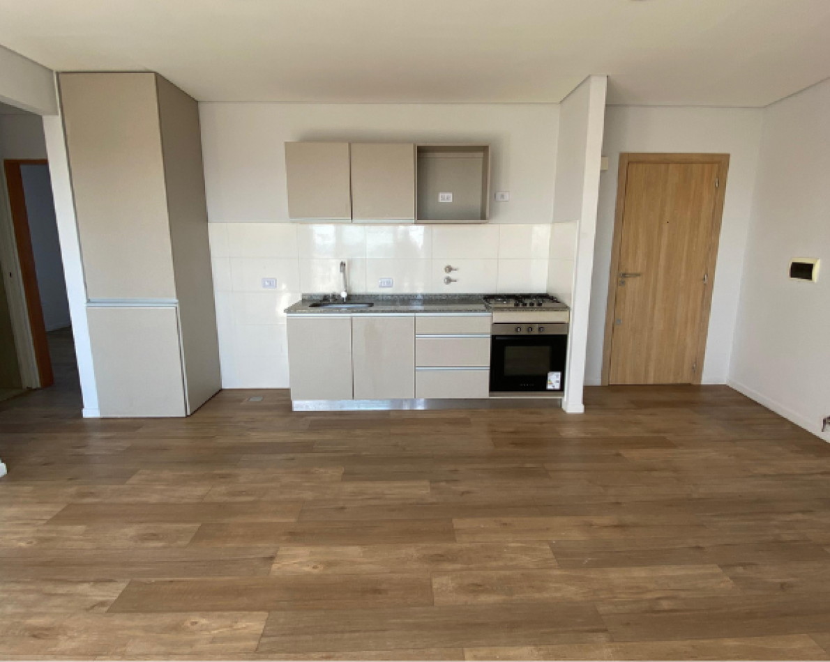 DEPARTAMENTO EN VENTA DE DOS DORMITORIOS + COCHERA.